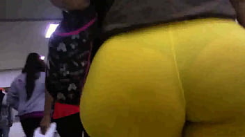 Big ass in yellow leggings marking thong