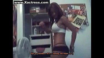 Sexy latina dances while getting dressed