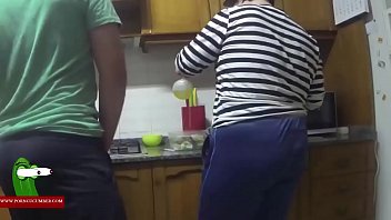 Giving her from behind in the kitchen GUI00226