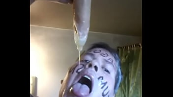Faggot dripping with loads of cum from a condom