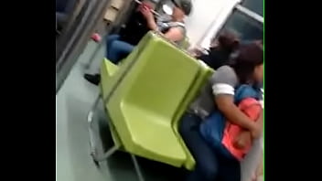 Cute girl with cleavage in the CDMX subway
