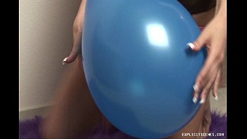 Nasty amateur babe teasing and playing with balloon