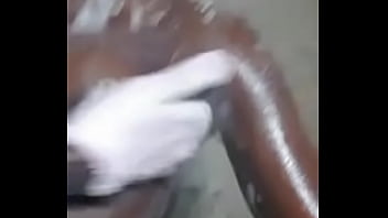 african woman washing her cunt