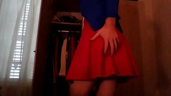 Cute secretary crossdresser masturbating in a red dress and blue blazer