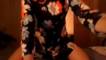 Crossdresser in cute flower dress having some webcam fun