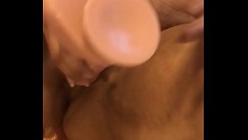 Loud Moaning NRI Desi wife using 9 inches dildo in her pussy