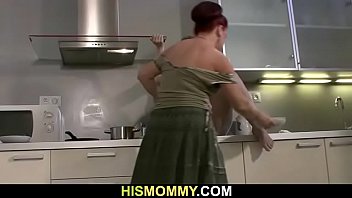 Lesbian mom and teen fucking in the kitchen