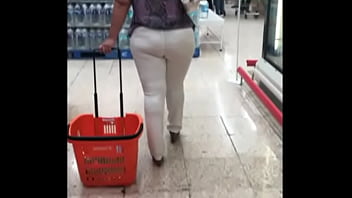 In the super with black thong and white pants
