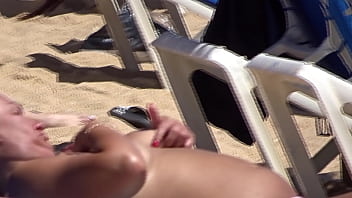 Small tits at the beach