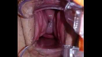 Cumming with a speculum spreading her pussy wide open