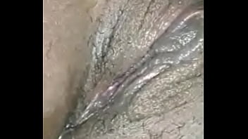 She was playing with her meaty wet pussy