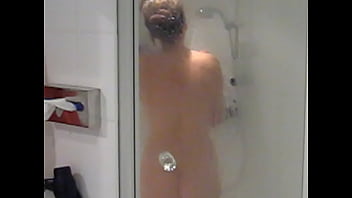 Dutch milf Jacqueline in the shower before her morning orgasm.