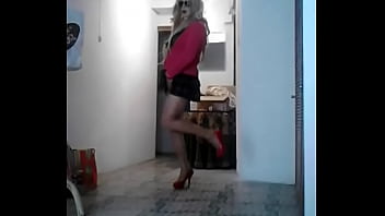 Lili cd submissive with red heels walks sexy