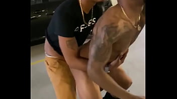 Horny niggers fucking in building parking lot