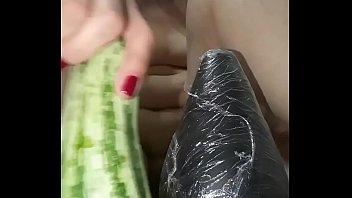 The bitch isn't content with just b., she loves to bust her tail in a big thick zucchini until the edge of her ass is loose