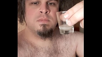 Drinking my own cum from a shot glass