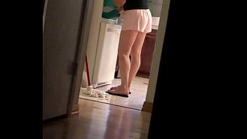 The maid cleaning the house