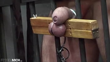 CBT testicle torture with testicle pillory tied up in the cage whipped tortured in the cell slave interrogation torment torment