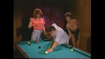 Nasty brunette Sharon Mitchell and playful redhaired floozie Viper became worn out muscular dude to the billiard saloon and made him fuck both of them right on the pool table