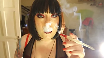 Fat Domme Tina Smua Smokes A Filterless Cigarette In A Holder