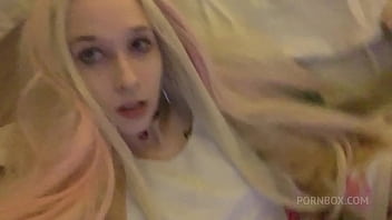 tiny teen in onesie showing little feet and toe sucking