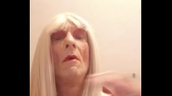 sissy Christine sucks her dildo