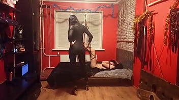 Dominatrix Nika tied a slave with ropes and fucked him in the ass with her strapon
