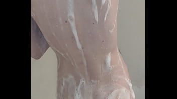 Skinny wife washing in the shower