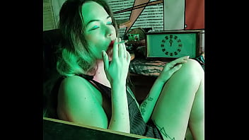 sexy stepsister smokes a cigarette