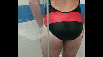 Tranny wearing adidas one piece swimsuit and teasing