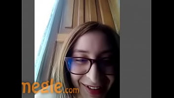Girl in glasses shows her slit