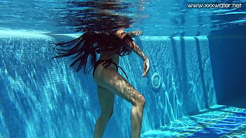 Swimming pool nudist action by sexy Latina babe Andreina