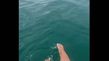 The warm sea water caresses my feet