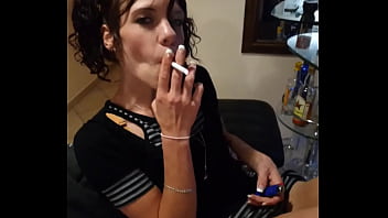 Skinny slut in short dress smoking showing her pussy