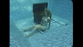 Beautiful Mermaid Maggie Underwater in a Treasure Chest