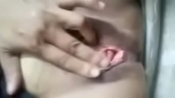 An older woman teases her pussy and shows off her clit until she squirts all over her pussy hole.