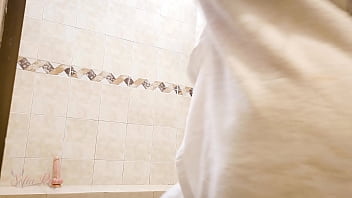 In the middle of a nice shower, I touch myself and masturbate until I cum.