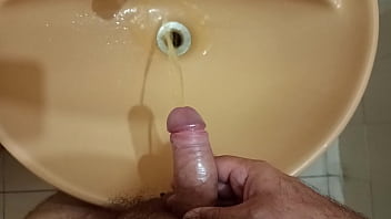 Hard cock pissing