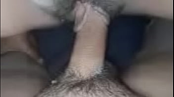 Thai porn star sucks cock and spreads her pussy, stuffing the cock in her clit until he cums inside her clit.