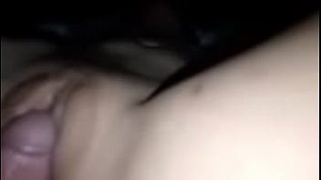 Fucking the pussy of a Thai student girl, spreading her pussy open and poking his cock in her clit until he squirts all over her clit.