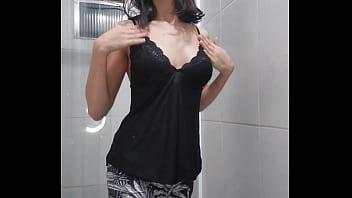 Beautiful white woman shows off in the bathroom while masturbating