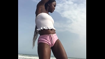 Crazybitch twerking hard in sexy clothes outdoor on the beach