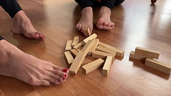 Playing Jenga with our feet