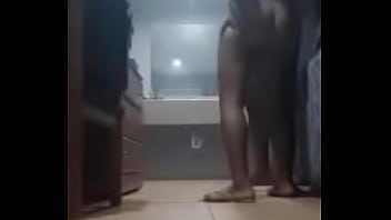Ebony in backroom fucking in booth