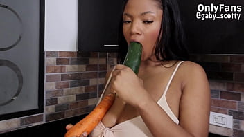 Gaby, the nympho, doesn't care if it's a vegetable... she wants to fuck her pussy with anything.