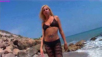 Blonde Laura on the beach